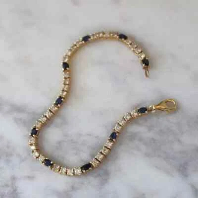 14K Yellow Gold Plated Oval Cut Lab Created Sapphire Women's Tennis Bracelet7.5" - Image 1 of 4