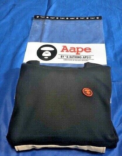 A BATHING APE (BAPE) Felpa con cappuccio APE DA BAGNO nera con cappuccio mimetico arancione
