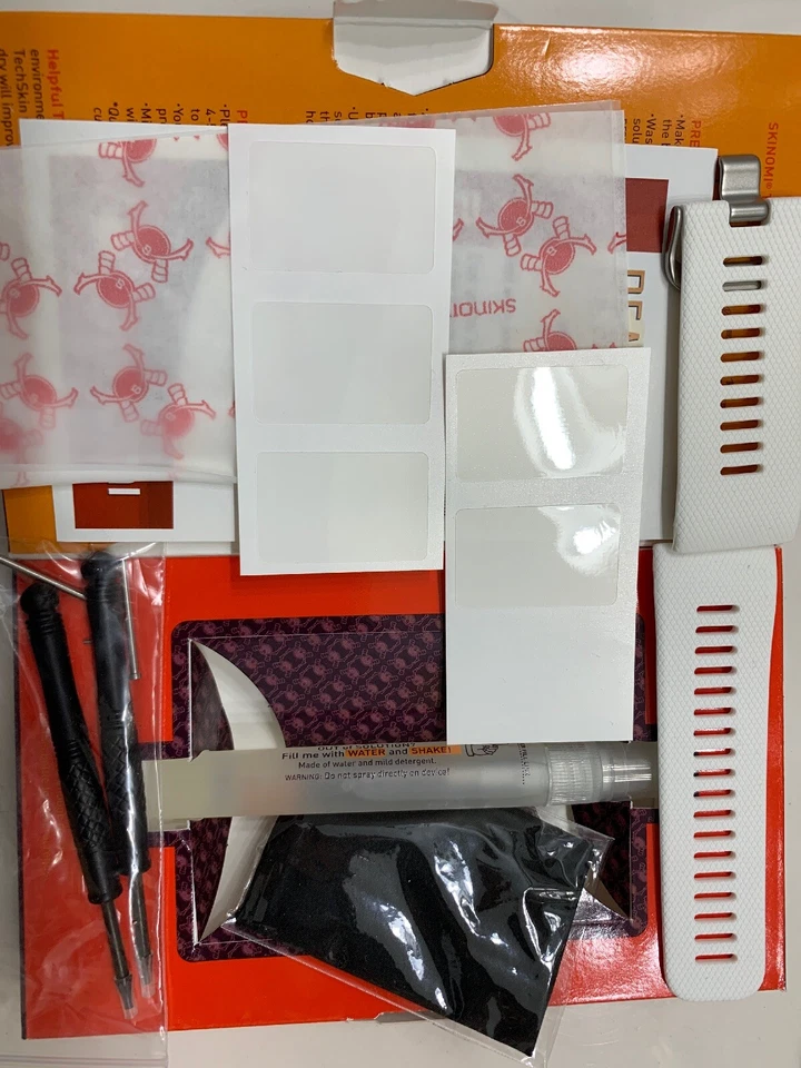 Protector de pantalla de película ultra transparente Skinomi Garmin Vivoactive HR paquete de 5 y banda blanca Foto 1 de 2