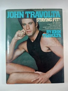 STAYING FIT John Travolta - Hardcover mit Staubjacke - 1984 - Erstausgabe 1. - Bild 1 von 7
