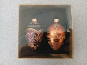 Celebrate Christmas with 2 Treasured Glass Egg Shaped Holiday Ornaments - Picture 1 of 3