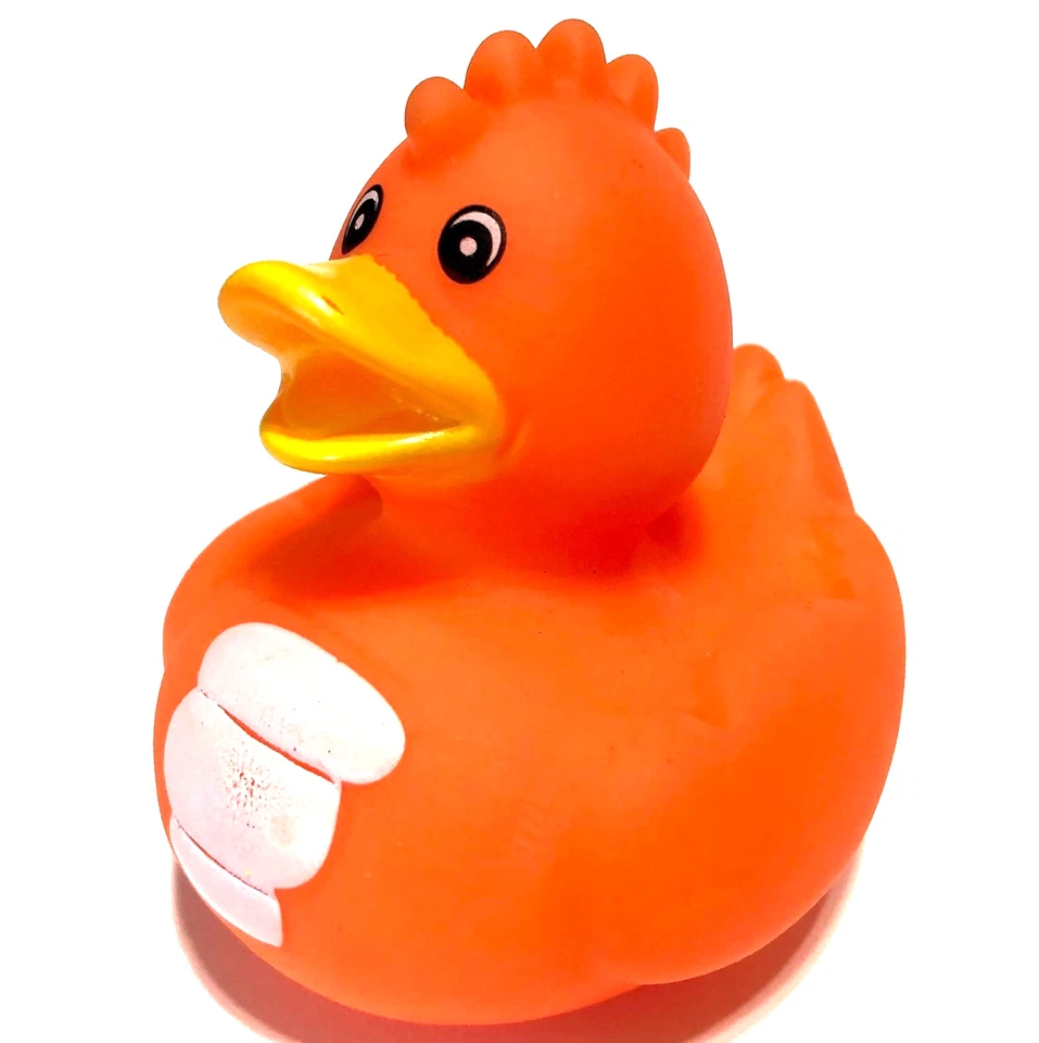 FRETE GRÁTIS - 2 1/2" FOFO NEON LARANJA PONTILHADO DINOSSAURO CRUZEIRO DE BORRACHA PATO - Imagem 1 de 1