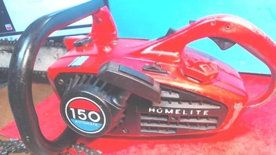 De colección- HOMELITE 150 Automático-Sierra de cadena -16" barra{-Para piezas}-Funciona-Bueno-Necesita Foto 1 de 4