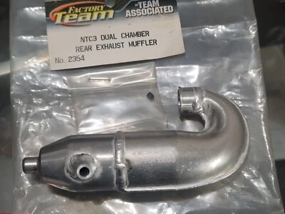 VINTAGE TEAM ASSOCIATED NITRO TC3 SILVER TUNED PIPE NEW NOS ! - Image 1 of 4