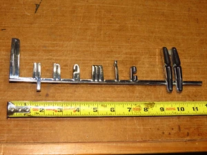 OEM used Oldsmobile 1959 Olds Dynamic 88 emblem ornament script trim 575392 - Bild 1 von 4