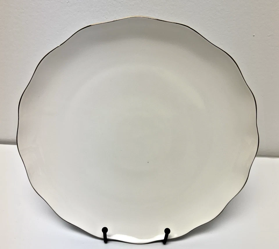 Juego de 4 platos de cena Pacifica Teaware blancos con borde dorado  Foto 1 de 1