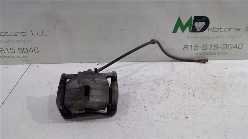 Pinza de freno de disco delantera izquierda Nissan Rogue Sport 2017-2022 OEM 41011-4BA0C Foto 1 de 4