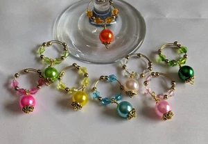 Set of 8 wine glass rings made with memory wire and beads. - Bild 1 von 10