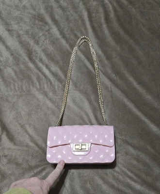 pink jelly quilted crossbody bag with a gold chain strap 7x5 - Image 1 of 4