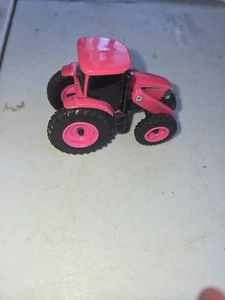 1/64 ERTL Collect N Play Case IH Pink Tractor with Loader, ZFN46705 - Picture 1 of 1