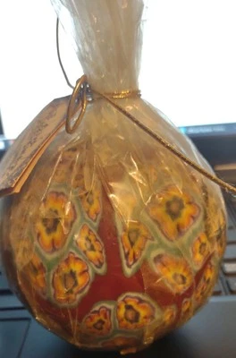 SWAZI CANDLE Made in The Kingdom Of Swaziland-marroon,gold,orange,blue pattern - Image 1 of 4