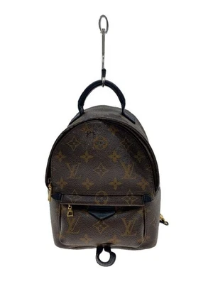 MOCHILA LOUIS VUITTON PALM SPRINGS MINI_MONOGRAMA MACASSAR_BRW PVC Marrón Usada Foto 1 de 4