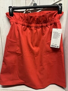 LULULEMON Women’s TRIP TAKER SKIRT Size 8 Carnation Red Relaxed Paperbag New - Picture 1 of 5
