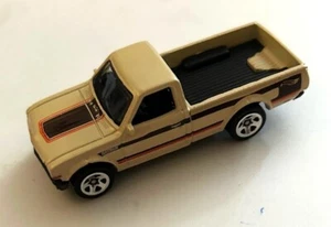 LOOSE HOT WHEELS EXCLUSIVE DATSUN 620 PICKUP BIEGE TAN MULTI PACK EXCLUSIVE - Picture 1 of 3