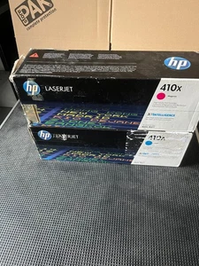 Pakiet kaset z tonerem HP 410A – cyjan CF411A i magenta CF413X | oryginalny | nowy - Zdjęcie 1 z 1