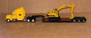 Norscot Toy, SEMI TRACTOR / TRAIL KING LOWBOY TRAILER WITH CAT EXCAVATOR (1/87) - Picture 1 of 5