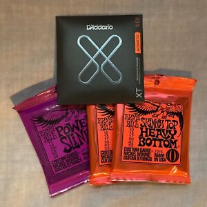 D'Addario and Ernie Ball - 4 sets (3x electric and 1x acoustic) guitar strings