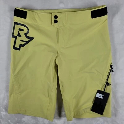 Race Face Cycling Shorts Youth Size Large Yellow Sendy Biking Zipper Pockets - Image 1 of 4