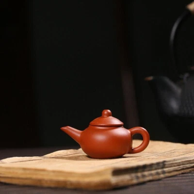 Mini tetera Yixing Zisha Dahongpao arcilla té mascota decoración del hogar en bandeja de té olla Foto 1 de 4