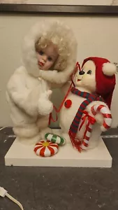 Las mejores figuras animadas de vacaciones de niña y muñeco de nieve de Santas Motionette de colección - Imagen 1 de 14