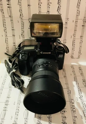 Canon EOS 1000F avec superbe objectif Sigma 28-70mm f/2.8 et flash - Photo 1/4