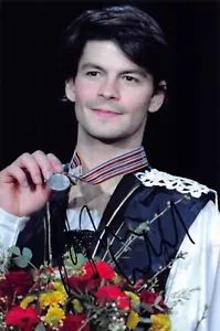 Stephane LAMBIEL - FRA - Eiskunstlauf - Figure Skating - Foto sig. 2.OS 2006 - Bild 1 von 1