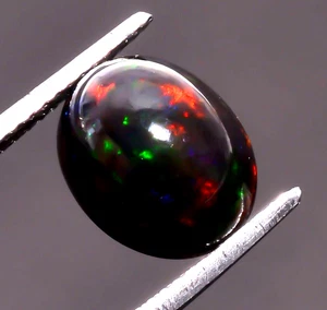 Natural Black Ethiopian Opal Oval Shape Cabochon Loose Gemstone 2.5 Ct 11X9X7 mm - Picture 1 of 3