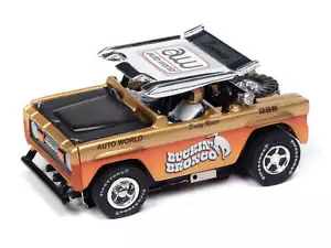 Auto World Xtraction SC407-1A 1972 Ford Baja Bronco Gold w/ Orange Race Graphics - Picture 1 of 4
