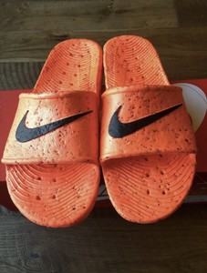 mens orange nike slides
