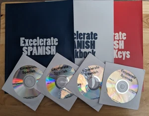 Excelerate Spanish COMPLETE SET: Lessons, Workbook, Answer Keys, & DVDs - Foto 1 di 9