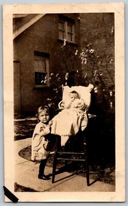 Toddler with Baby In A High Chair 1920s Original Antique Photograph - Picture 1 of 2