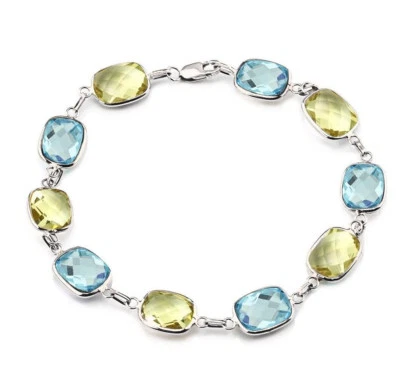 Pulsera de oro blanco 14K con corte cojín limón y topacio azul 7,5 pulgadas Foto 1 de 3