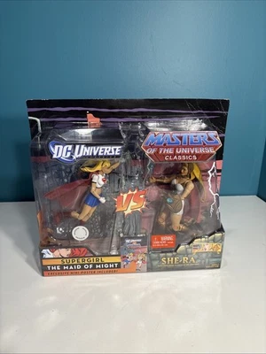 DC Universe Supergirl vs MOTU She-Ra Paquete de 2 - Exclusivo de Toys "R" Us - NUEVO Sellado Foto 1 de 4