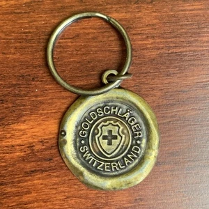 Vintage Keychain GOLDSCHLAGER SWITZERLAND Key Ring Brass Schnapps Liqueur - Picture 1 of 3