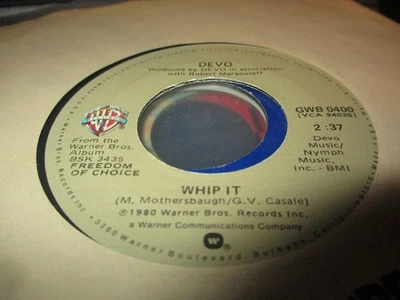 1985 DEVO Whip It W/Girl U Want US 7" Warner Bros. GWB-0400 NM/VG+ - Image 1 of 2