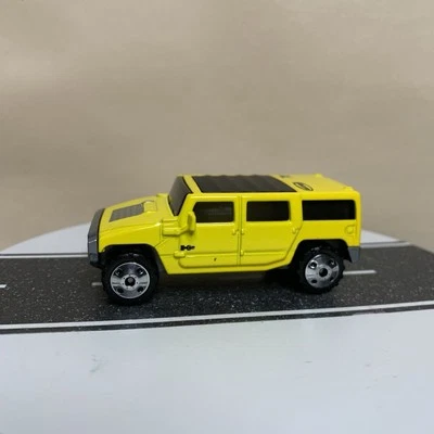 2002 Matchbox Hero City #73 Hummer H2 SUV Concept Yellow 1:72 w/Gray Base 1:72  - Image 1 of 4