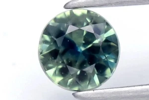 Saphir d’Auvergne 0.26ct VS bleu/vert taille rond brillant - Imagen 1 de 2