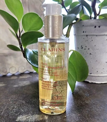 Aceite Limpiador Total Clarins Huile Tres Demaquillante 5 OZ con Desmaquillante  Foto 1 de 2