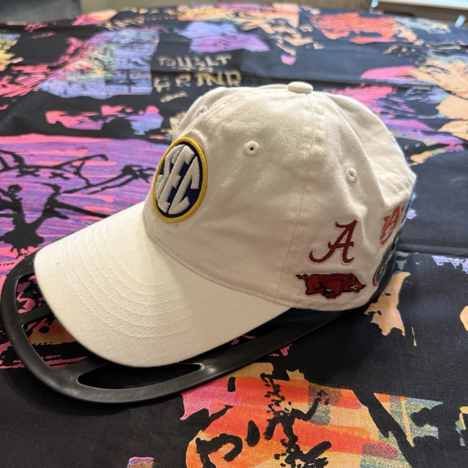 NWOT UNIVERSITY OF ARKANSAS SEC COLLEGES AOP ADJUSTABLE HAT IN WHITE ZEPHYR OSFM - Image 1 of 4