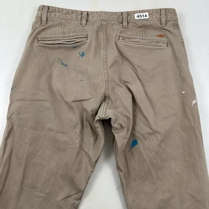 Pantalones elásticos Dockers para hombre Alpha caqui calce atlético 31x30 beige salpicaduras de pintura - Imagen 1 de 12