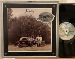 America Holiday Vinyl LP WB W 2808 NM 1st Pressing Tin Man Lonely People Hype - Picture 1 of 7