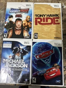 4 Wii Games Cars 2, Tony Hawk Ride, Smack down Vs Raw 08, Michael Jackson - Picture 1 of 3