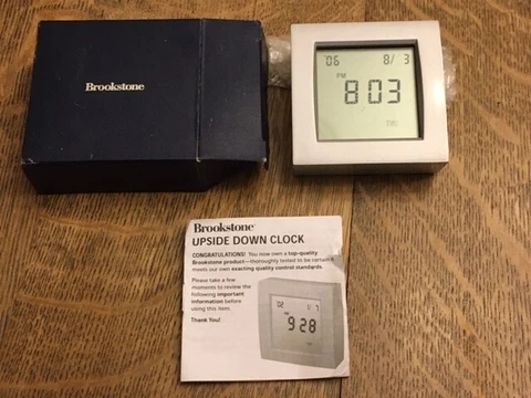 BROOKSTONE - QUARTZ TRAVEL CLOCK, WORLD TIME, TEMPERATURE, TIMER. METAL BODY Cover