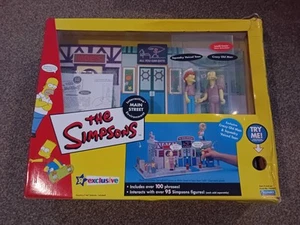 WOS PLAYMATES INTERACTIVE THE SIMPSONS ENVIRONMENT MAIN STREET ACTIONFIGUREN-SET - Bild 1 von 8