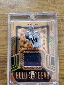 DK Metcalf #038/299 Gold Gear 2022 Panini Gold Standard