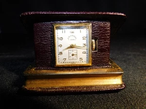 Reloj/reloj de viaje vintage Enicar Book Of Time Vol II encuadernado en cuero 7 joyas  - Imagen 1 de 8