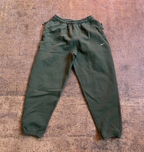 Pantalones deportivos Nike de vellón verde para hombre con logotipo Swoosh medianos - Imagen 1 de 8