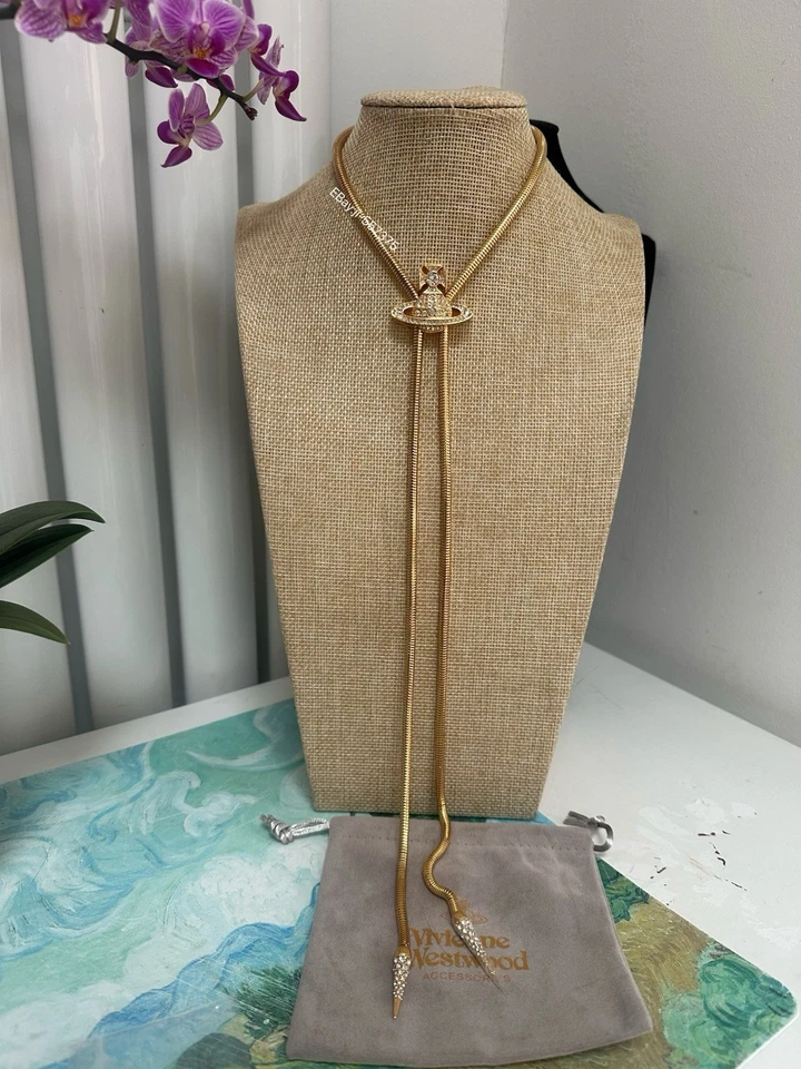 Vivienne Westwood Bolo tie Large Orbit Pendent Necklace Long Chain Gold - Image 1 of 4