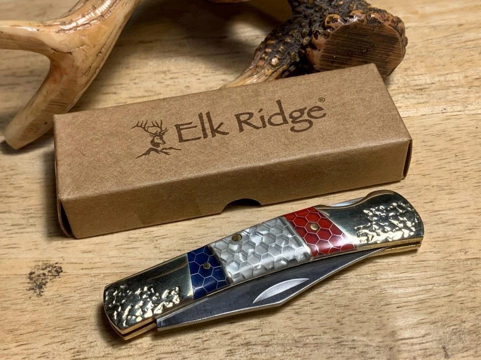 Navaja de bolsillo Elk Ridge roja, blanca y azul C-Tek Lockback 3 1/2" ER945 Foto 1 de 4