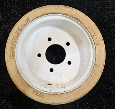 (CANTIDAD 1) Conjunto de rueda de 5 tacos elevador de tijera sin marcas Carlisle 12x4, blanco Foto 1 de 4